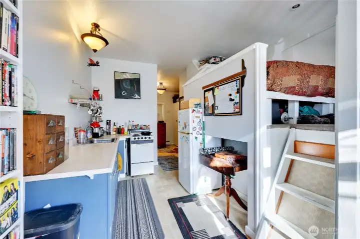 Loft bed on right is a queen.