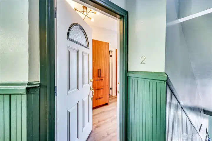 Back up the stairs to the right side of building's residential unit #2, available furnished.