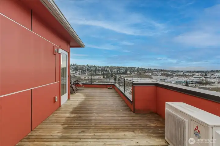 Rooftop deck with sweeping views of the Olympic Mountains and Ship Canal