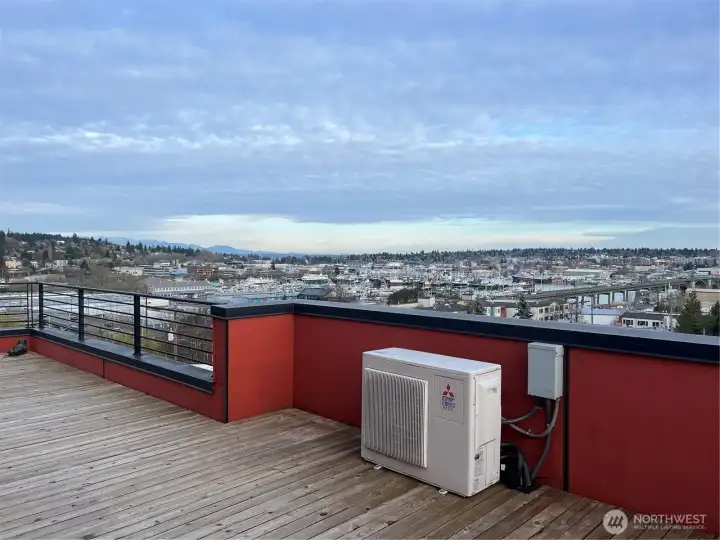 Rooftop deck with sweeping views of the Olympic Mountains and Ship Canal