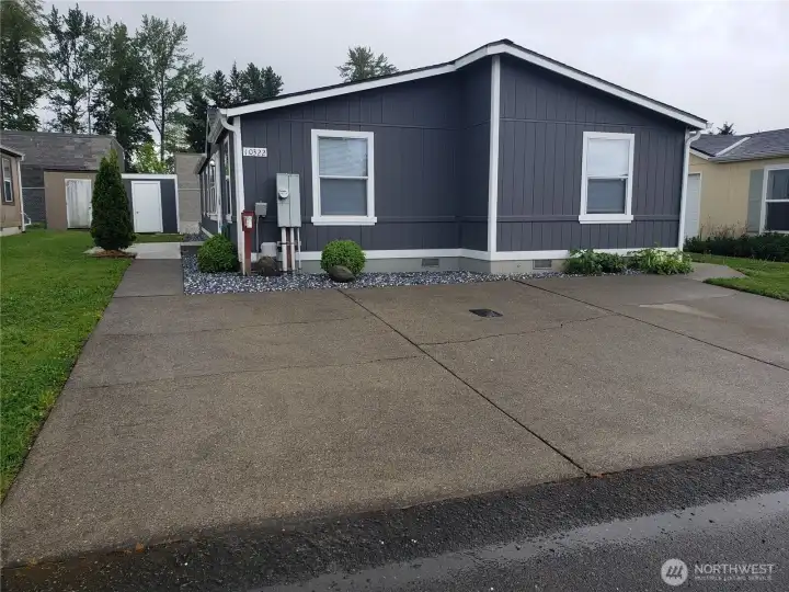 Front Picture of the Home Showing Parking for up to Three Vehicles.