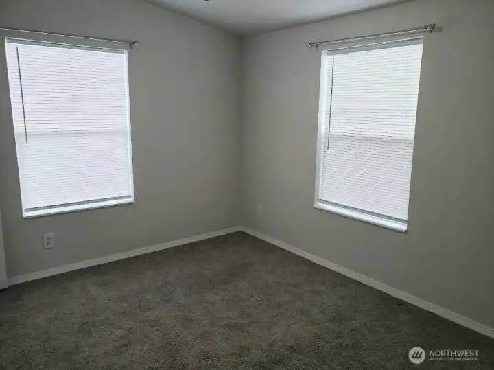 A Different View of the Really a Nice Size Second Bedroom Showing Newer Trim, and Carpet.