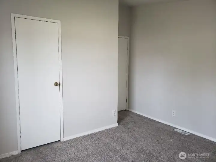 Another Picture of the Third Bedroom Showing Newer Trim, and Carpet Showing Closet.