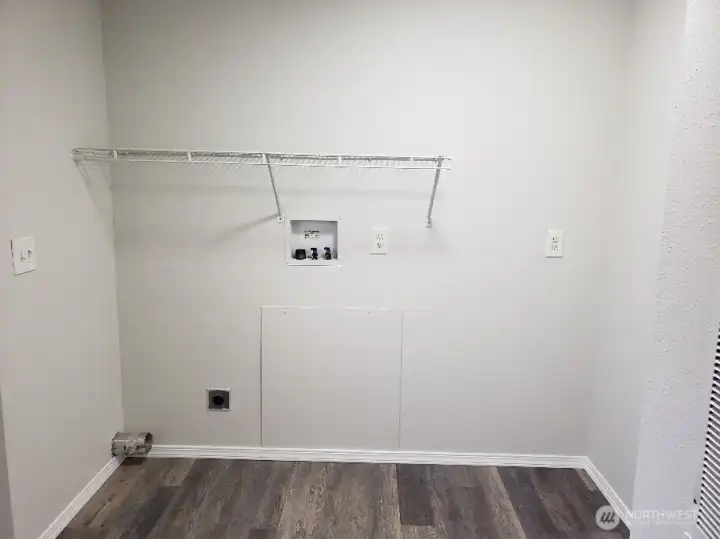 Utility Room Showing Storage Shelf.