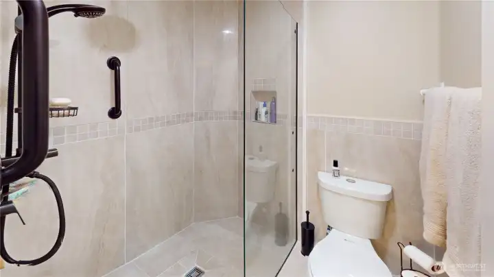 Toilet room w/ walk-in shower