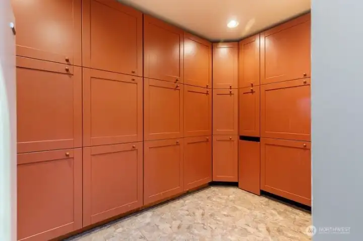 Storage room qith plenty of cabinet space and pullouts! There is even hidden a dog door that could be put to use if needed.