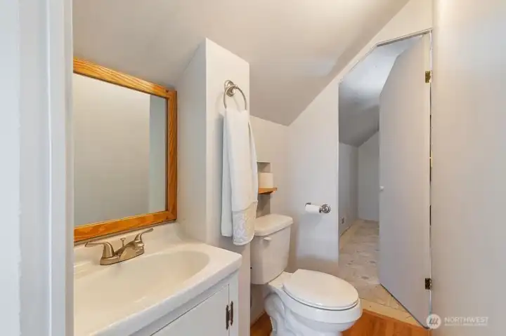 Convenient half bath upstairs.
