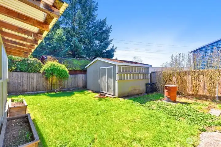 Backyard with large shed.