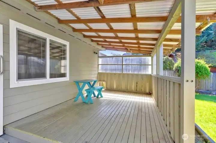 Back deck enclosed for added privacy.