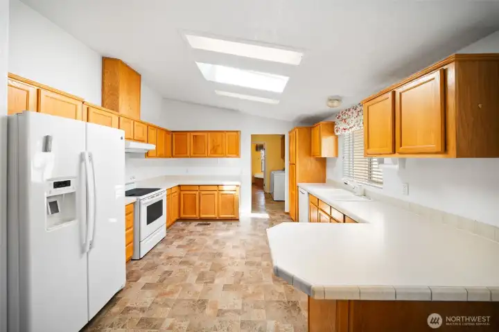 Spacious eat-in kitchen with abundant natural light