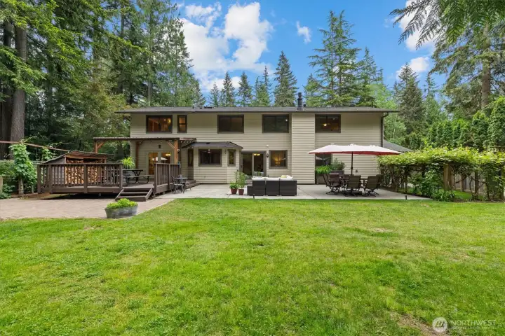 The oversized 35,000sf lot is totally private, is flat for optimal use and has tons of room to play!