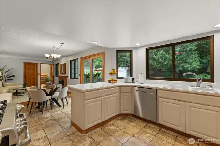 The open-concept floorplan blends the kitchen and family room perfectly together.  Everyone is part of the action!