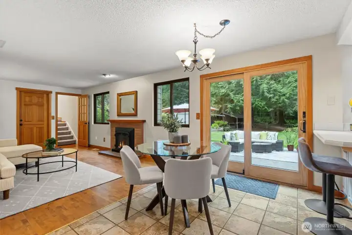 Beautiful hardwood floors and rich millwork are a common theme throughout this classic home.  All of the windows have been replaced, and the slider is a Frenchwood Gliding Door by Anderson.