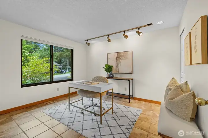 Even though you are only minutes from Microsoft, you may need to work from home.  Not a problem here, this home office is oversized and perfectly private.  A great spot to get work done!  For those who do not work from home, this room would make a fabulous 5th bedroom for guests or live-in extended family!