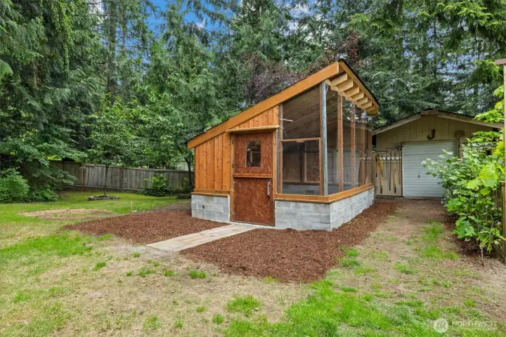 Here is a picture of the greenhouse and adjacent garden shed.