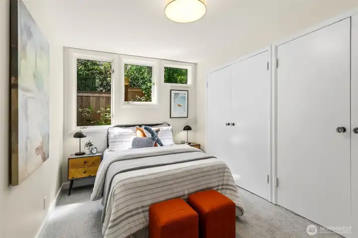3 of the 3 main-level bedrooms with two large closets.