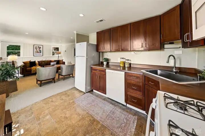 The lower level has a full kitchen. Great option to rent, for a MIL or just extra space.