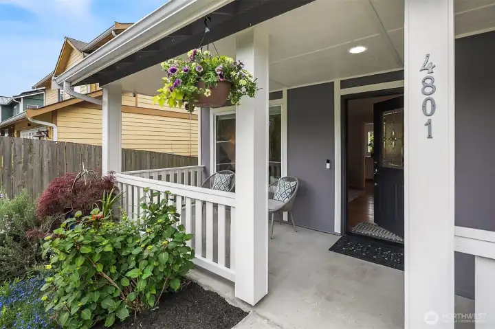 Welcoming front porch and pavered front patio