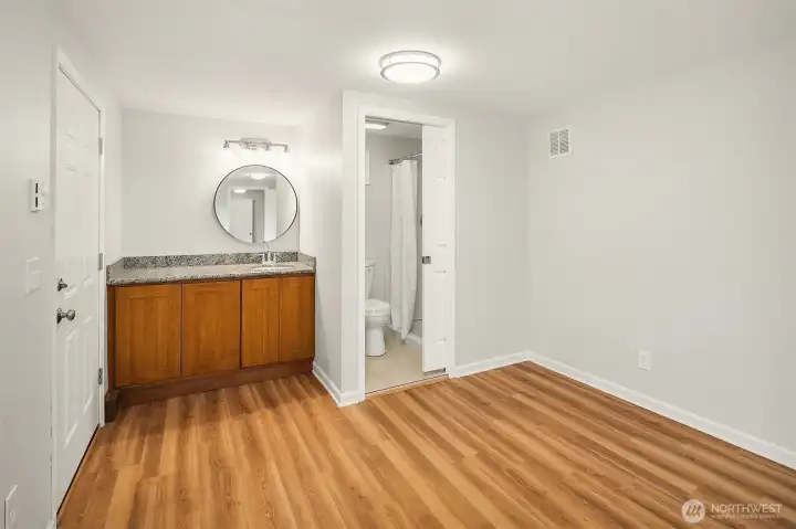 Another finished room with 3/4 bath