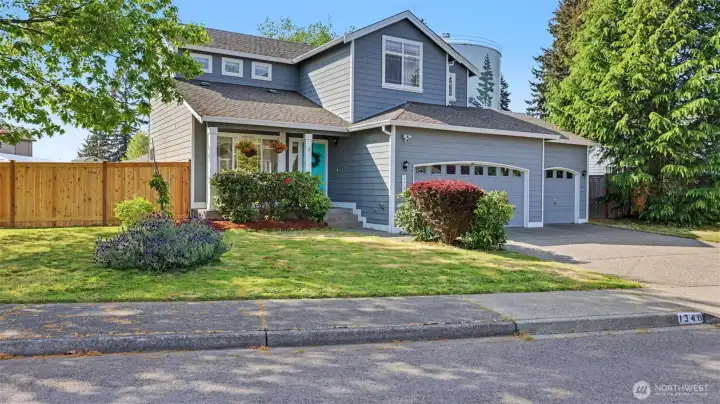 Welcome home to a spacious front yard with beautiful curb appeal and room to enjoy outdoor living