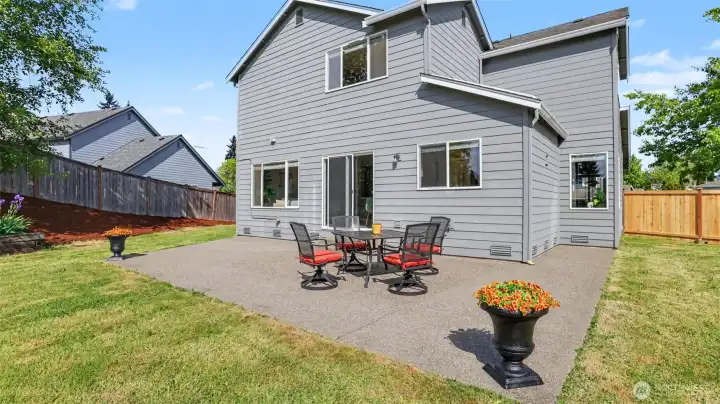 Spacious backyard patio perfect for outdoor dining