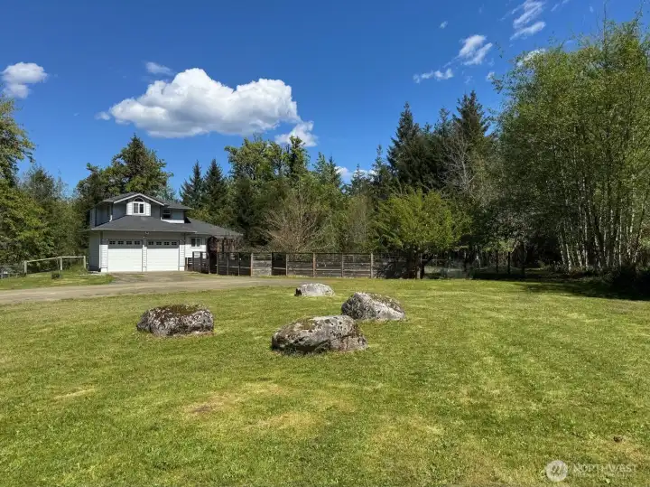 So many options with the land at the top of the drive. Enough room to put in a circular drive if you wanted.