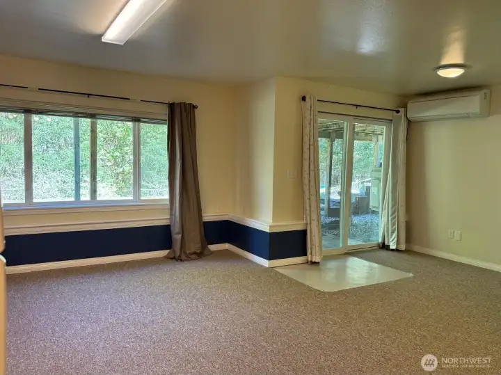 Ample space for whatever your needs may be. This ground floor living area has great views and access to the back yard.