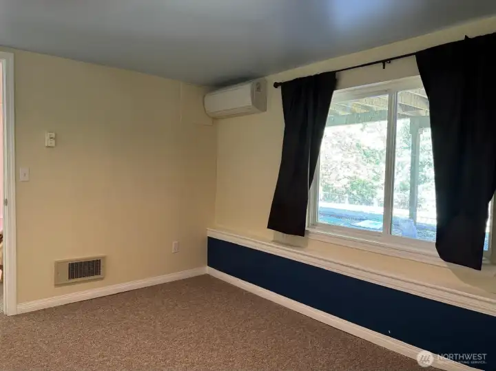 A great view out to the back yard with its own mini-split for comfort.