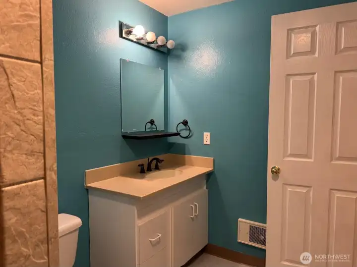 Everything you need in a bathroom to help make this level a complete living space.