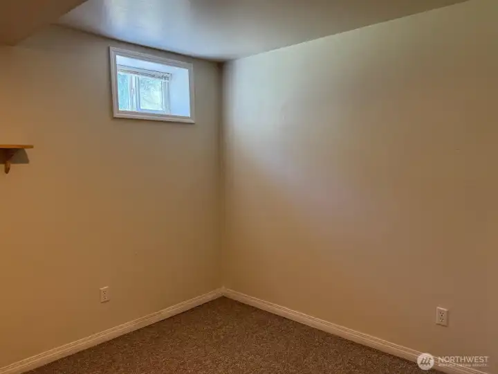 A bonus room downstairs that could easily be an office, craft room or quiet library space.