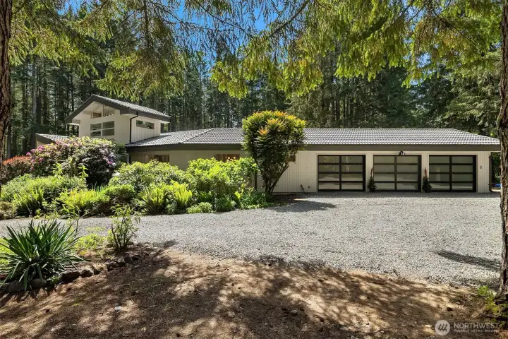3 Car Garage and Additional Parking Area