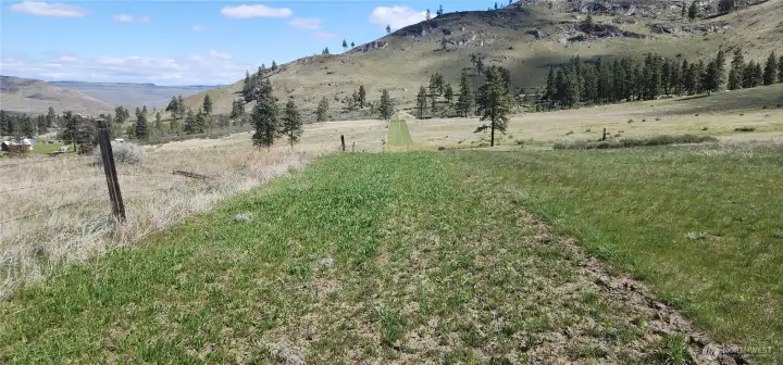 This is the 30' wide access easement from Ponderosa Ridge Lane to just 3 parcels with access. The subject parcel is in the middle of the 3 parcels.