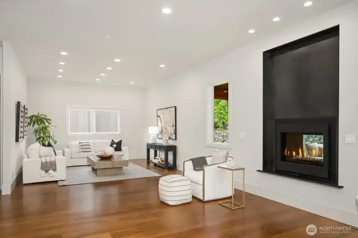 Open floor plan with 2-way gas fireplace