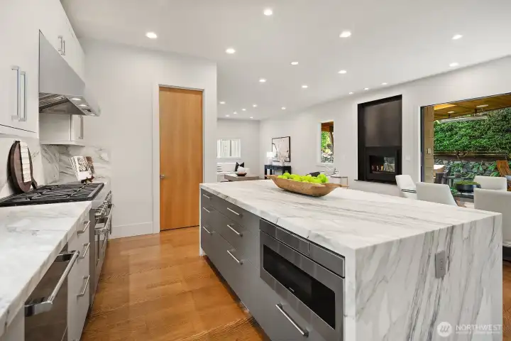 Walk-in pantry, custom cabinets, and island is the centerpiece of the kitchen.