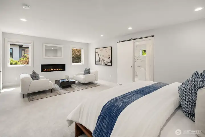 Upper level primary suite has brand new luxury carpet
