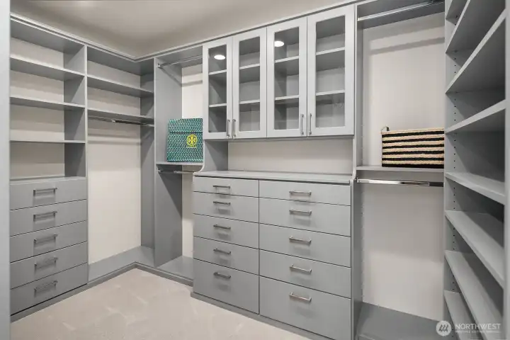 Spacious custom walk-in closet in upper-level primary suite
