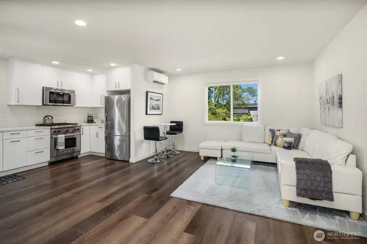 High-end finishes, Wolf gas range, SS appliances, and stack washer/dryer