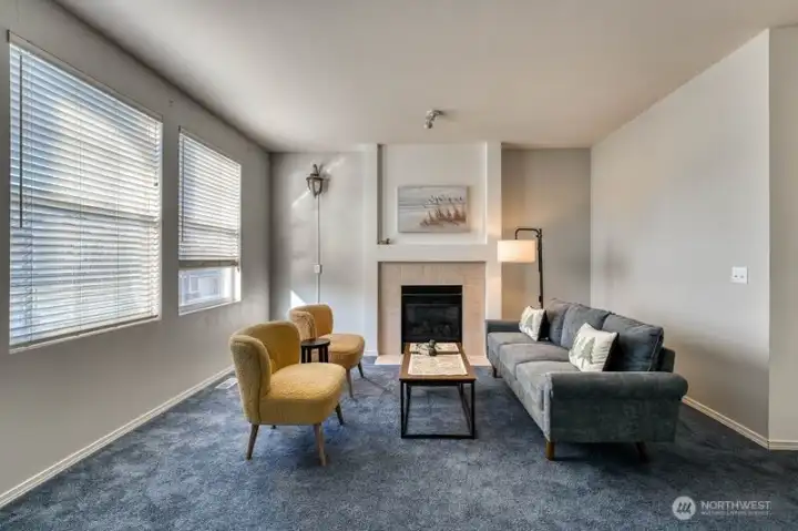 Upper level Floor 2 open living area with gas fireplace. Upper level Floor 2 open living area with gas fireplace.