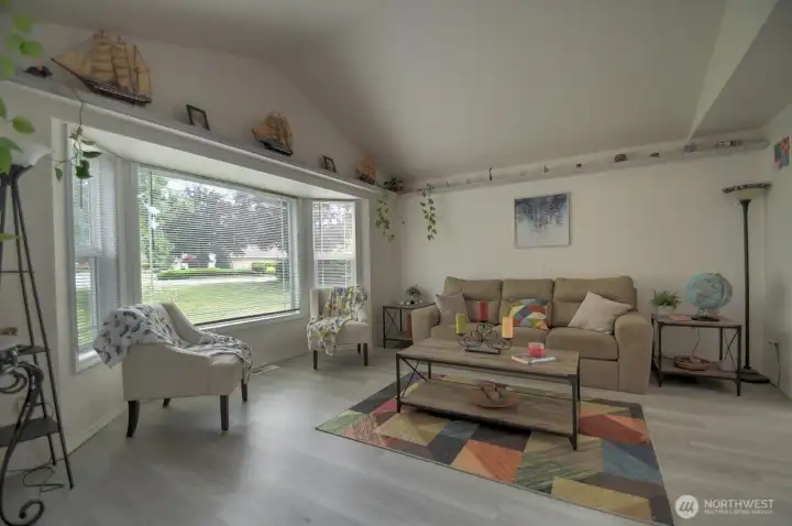Formal living room with tons of natural light.