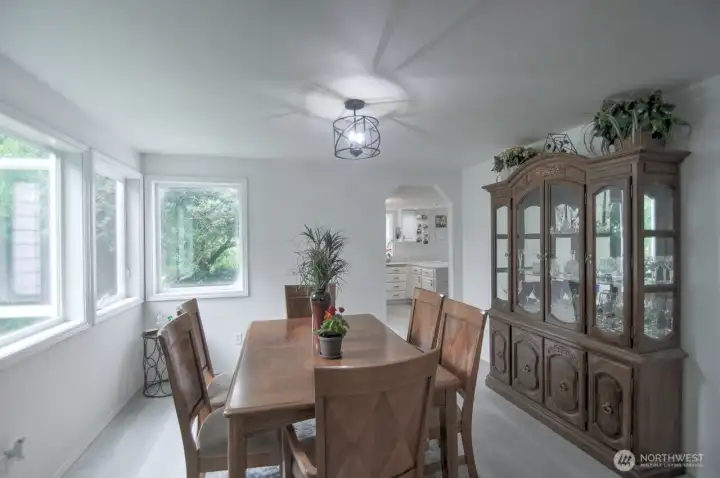 Light filled formal dining room.