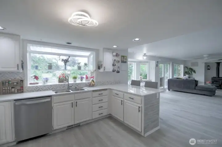View from the kitchen into the dining area and family room.