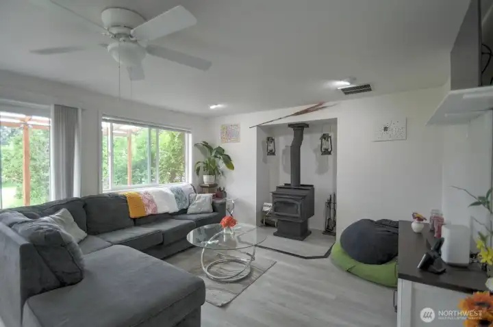 Cozy family room with free-standing stove.