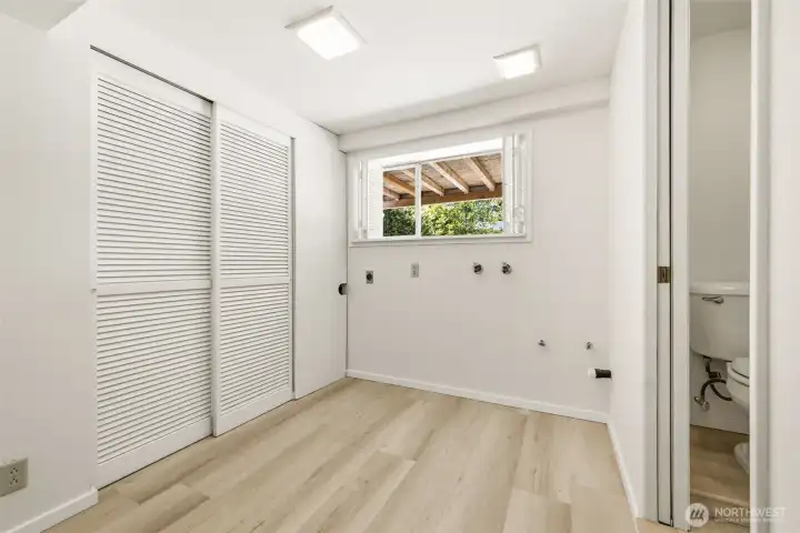 Lower Level Utility Room + Half Bath