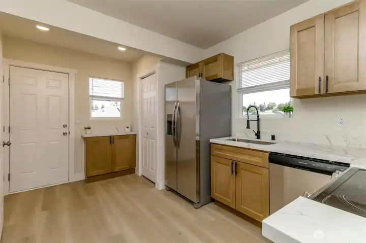 Brand new kitchen cabinets and sleek quartz countertops and brand spanking new appliances too!
