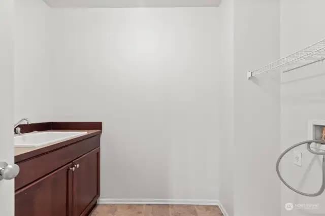 Conveniently located, upstairs Laundry with oversize sink