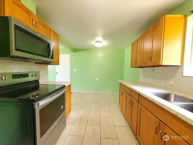 All appliances included. Note: Walls are in the process of getting fresh new white paint.