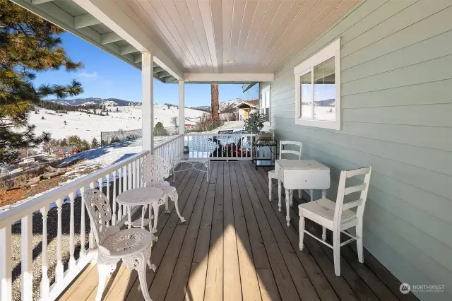 Fabulous views in all directions from this covered front porch. Grab morning coffee and watch the sunrise to the east or hang with a good book on a warm summer day and take in all the natural beauty that abounds.