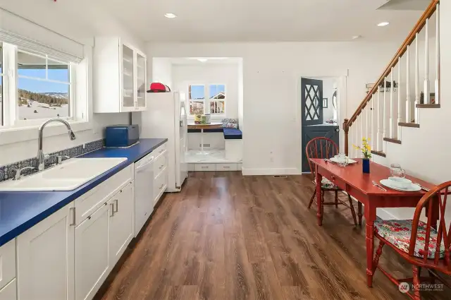 Bright, light and airy best describes this lovely kitchen/dining space...