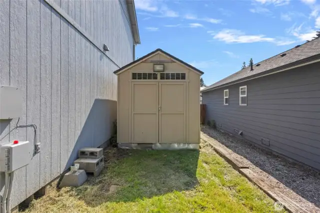 There are two great sheds, both with lights and outlets. They are back to back, one facing towards the front and the other facing towards the rear.