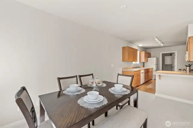 Plenty of wall space for credenza, china hutch or larger table.